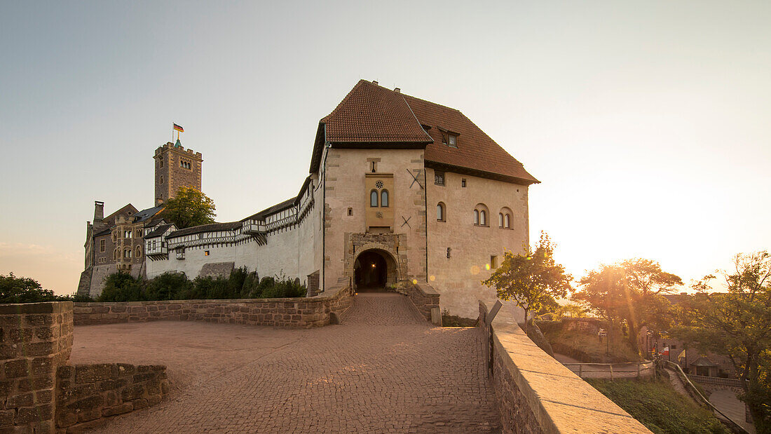 Gatehouse and rampart of Wartburg castle in the light of the setting sun, Eisenach, Thuringia, Germany, Europe