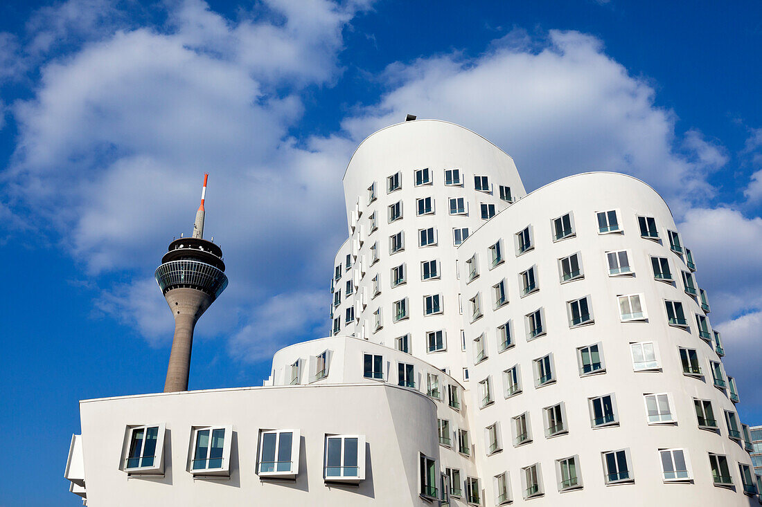 Televison tower and Neuer Zollhof (Architect: F.O. Gehry), Medienhafen, Duesseldorf, North Rhine-Westphalia, Germany