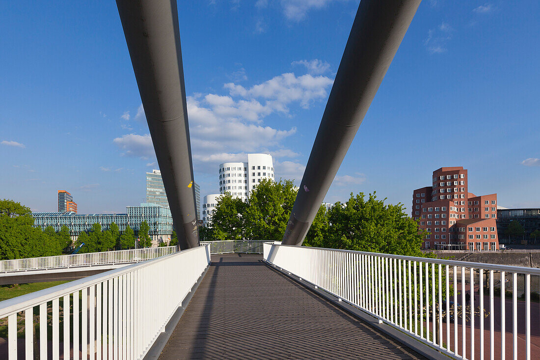 Bridge at Medienhafen, view to Neuer Zollhof (Architect: F.O. Gehry), Duesseldorf, North Rhine-Westphalia, Germany