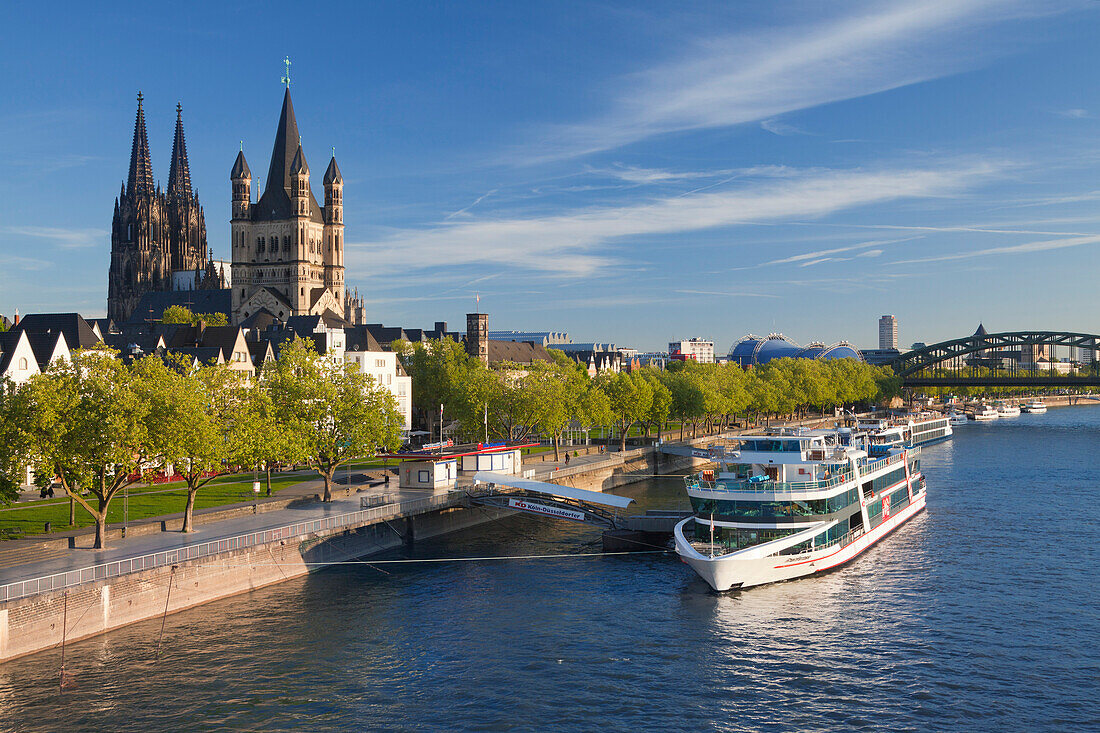 View over the Rhine river to the Old town with Gross-St Martin Cologne Cathedral, Cologne, North Rhine-Westphalia, Germany