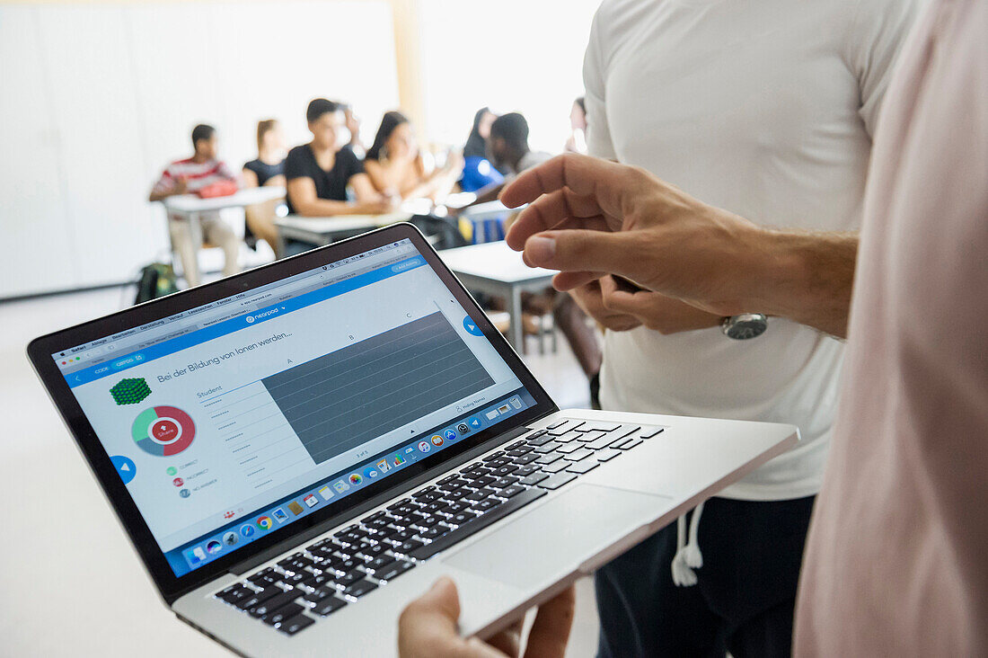 class in school, working with smartphones and laptops, Baden-Wuerttemberg, Germany