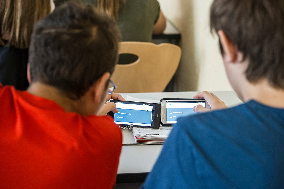 class in school, working with smartphones, Baden-Wuerttemberg, Germany