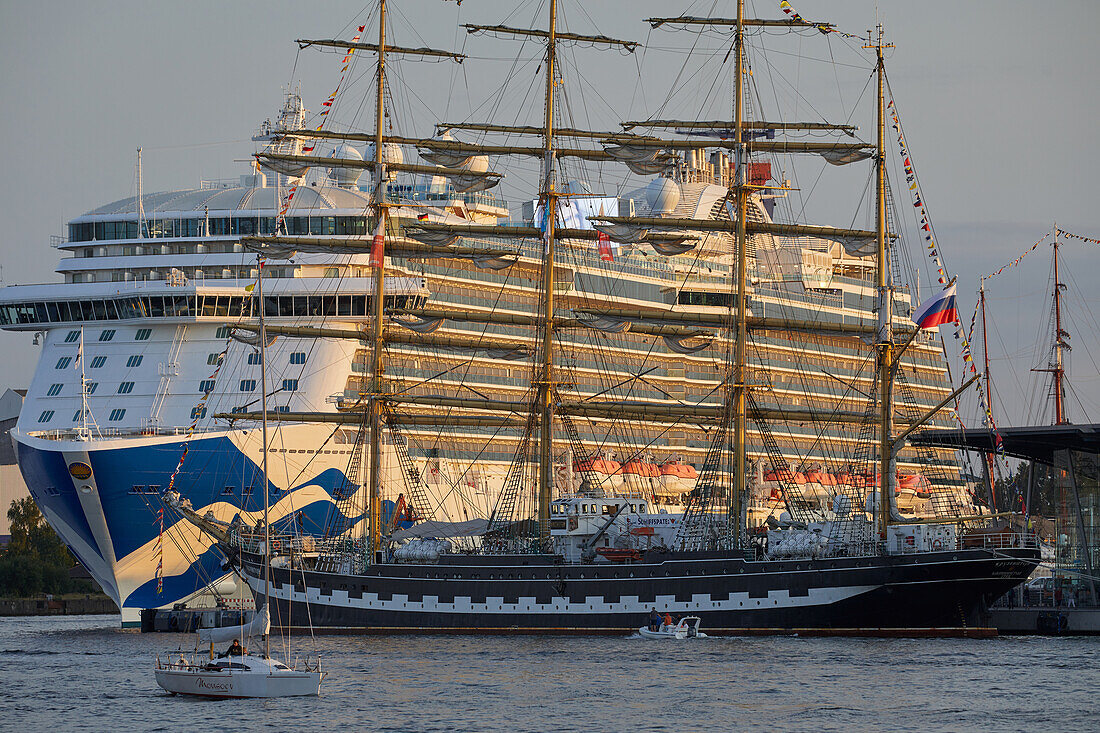 Cruise ship and traditional sailing ship at the Hanse Sail Rostock, Warnemuende, Mecklenburg Vorpommern, Germany