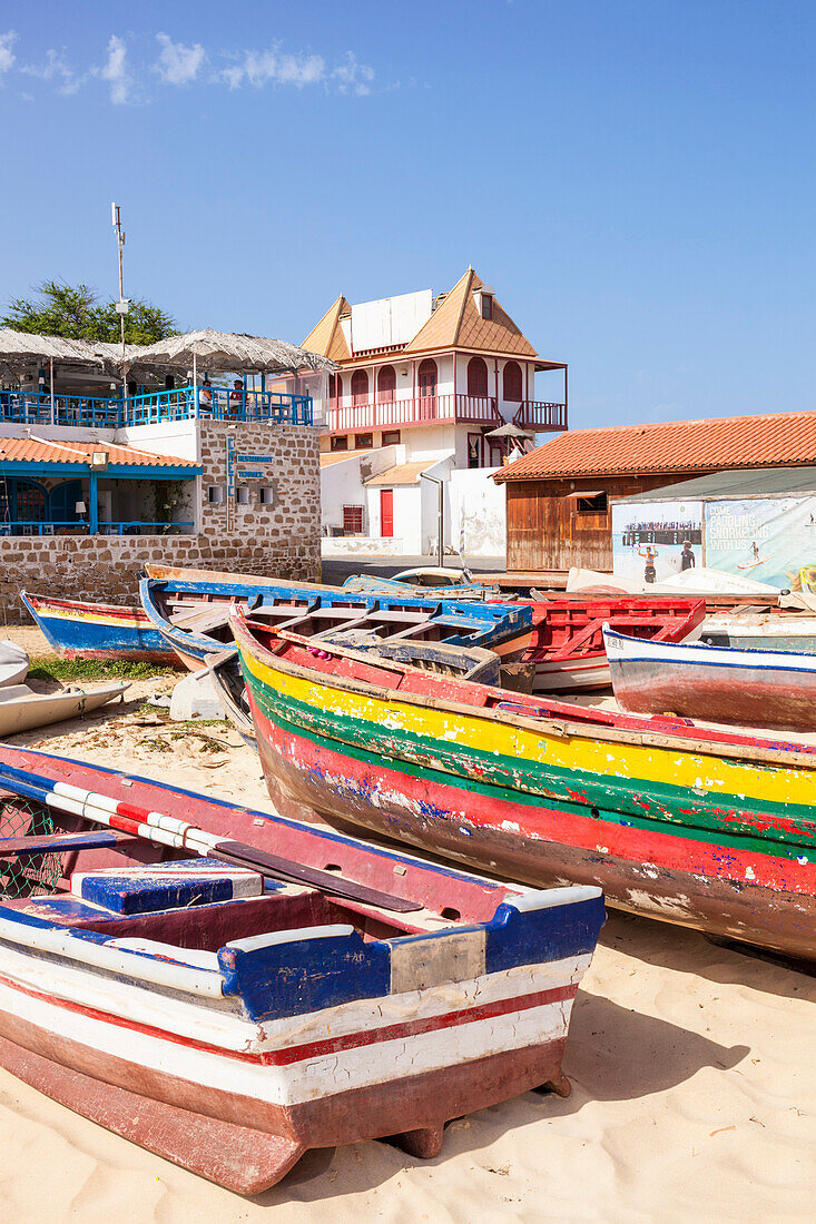 Colourful traditional local fishing boats on the beach at Santa Maria, Praia da Santa Maria, Sal Island, Cape Verde, Atlantic, Africa