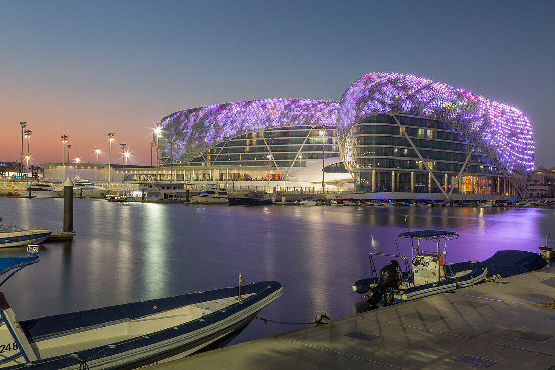 The Yas Viceroy Hotel and Yas Marina at dusk, Yas Island, Abu Dhabi, United Arab Emirates, Middle East