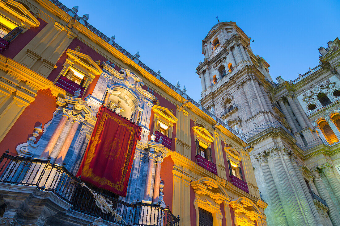 View of Cathedral in Plaza del Obispo at dusk, Malaga, Costa del Sol, Andalusia, Spain, Europe