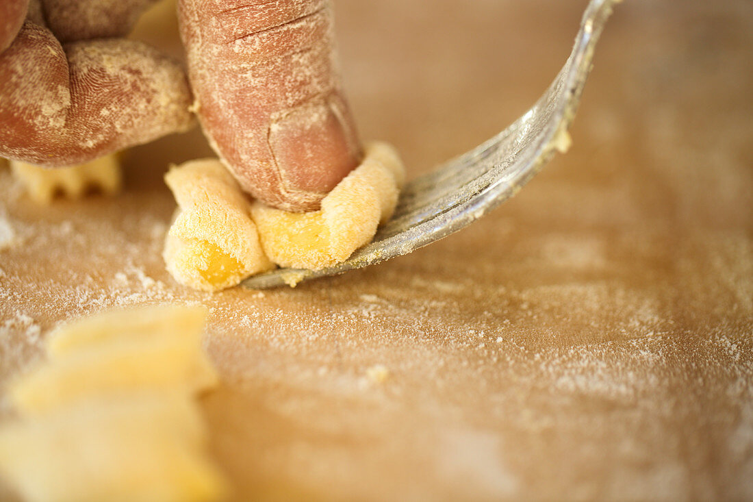 Hand rolling pasta