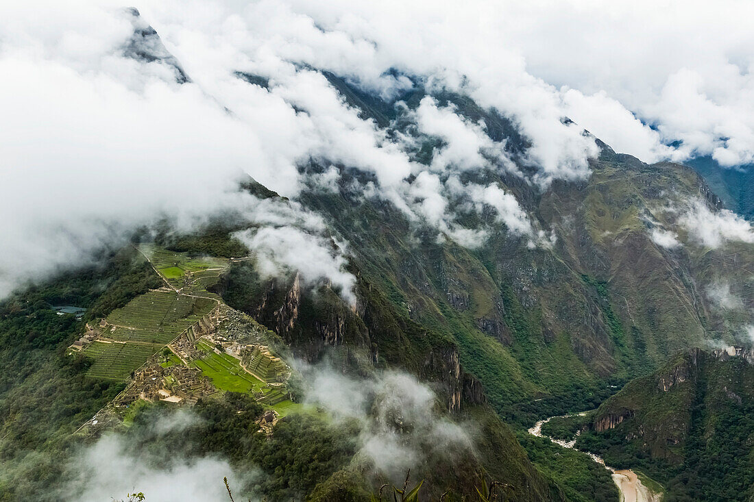 'Aerial view of Machu Picchu Citadel with Urubamba River; Cusco Region, Peru'