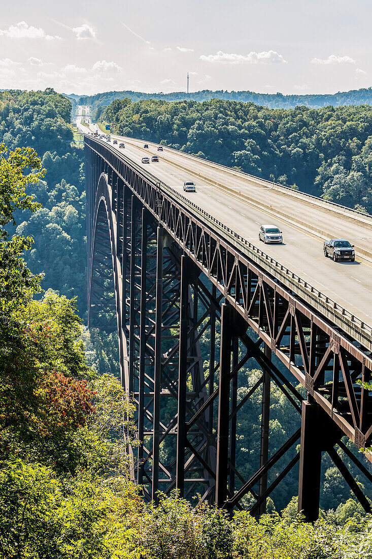 'The New River Gorge Bridge, a steel arch bridge 3,030 feet long over the New River Gorge near Fayetteville in the Appalachian Mountains of the eastern United States; West Virginia, United States of America'