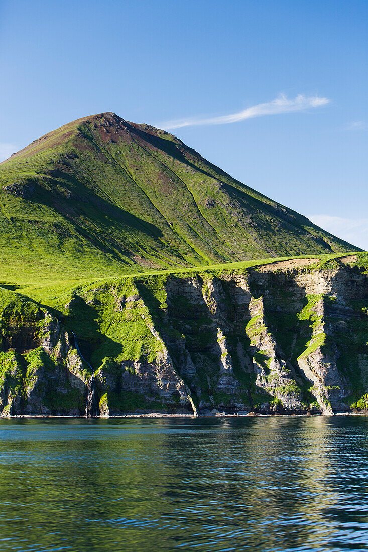'The Pallisade Cliffs In Ikatan Bay Of False Pass, Also Known As Isanotski Strait, In Summertime; Southwest Alaska, United States Of America'