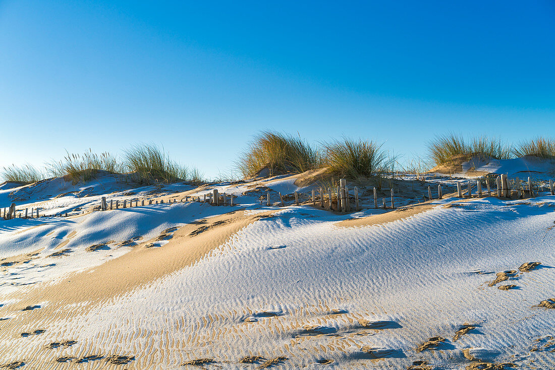 A skiff of snow on the sandy beach, South Shields, Tyne and Wear, England