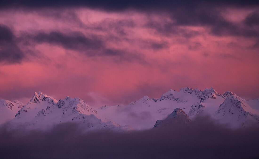 Kachemak Bay State Park at sunset with glowing pink sky, Alaska, United States of America