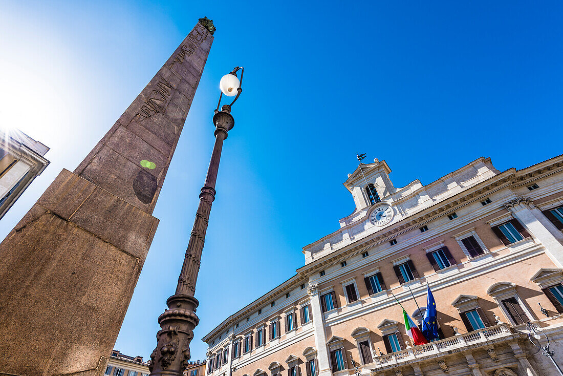 The obelisk Obelisco del Quirinale with the government palace, Rome, Latium, Italy