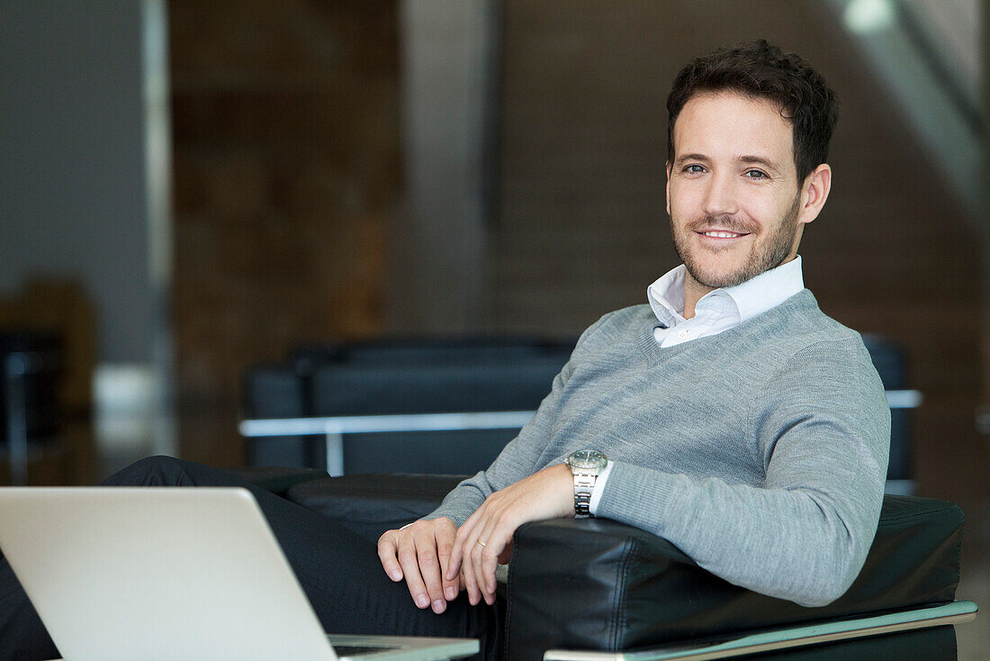 Businessman using laptop computer