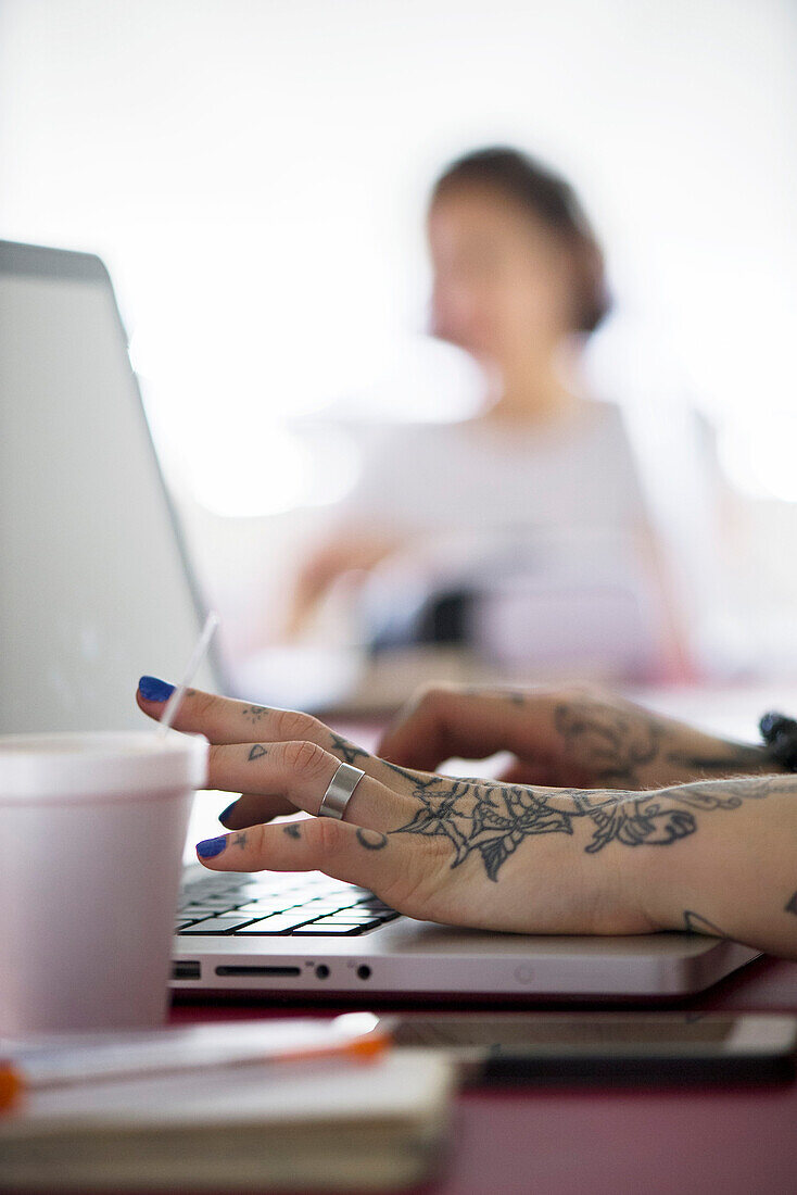 Woman using laptop computer