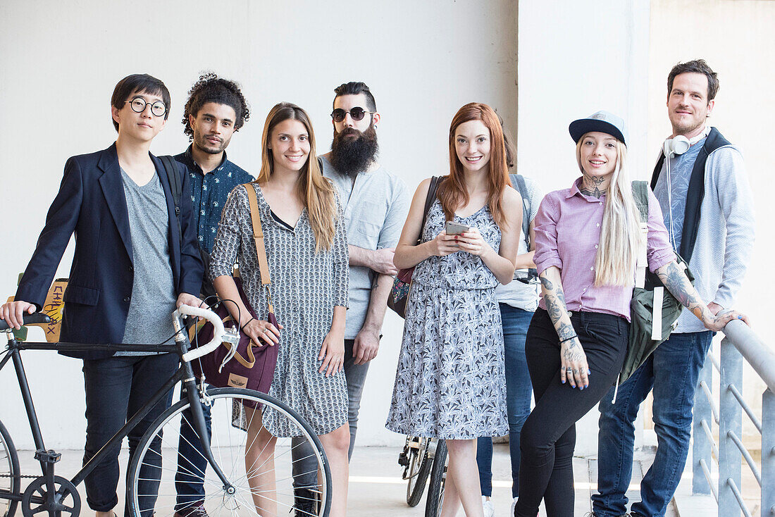 Group of hipsters standing together outdoors