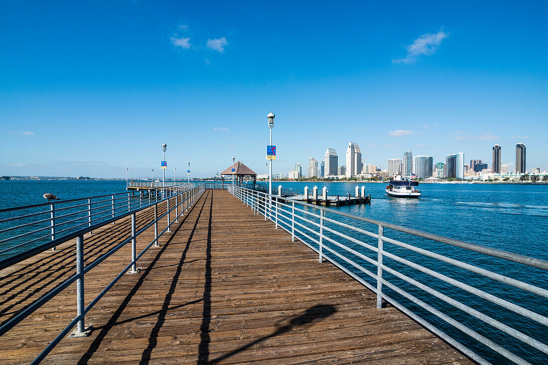 Boat pier in front of the skyline of San Diego, California, United States of America, North America