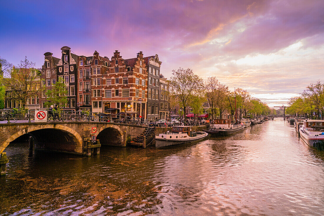 Canal scene at dusk, Amsterdam, Netherlands, Europe