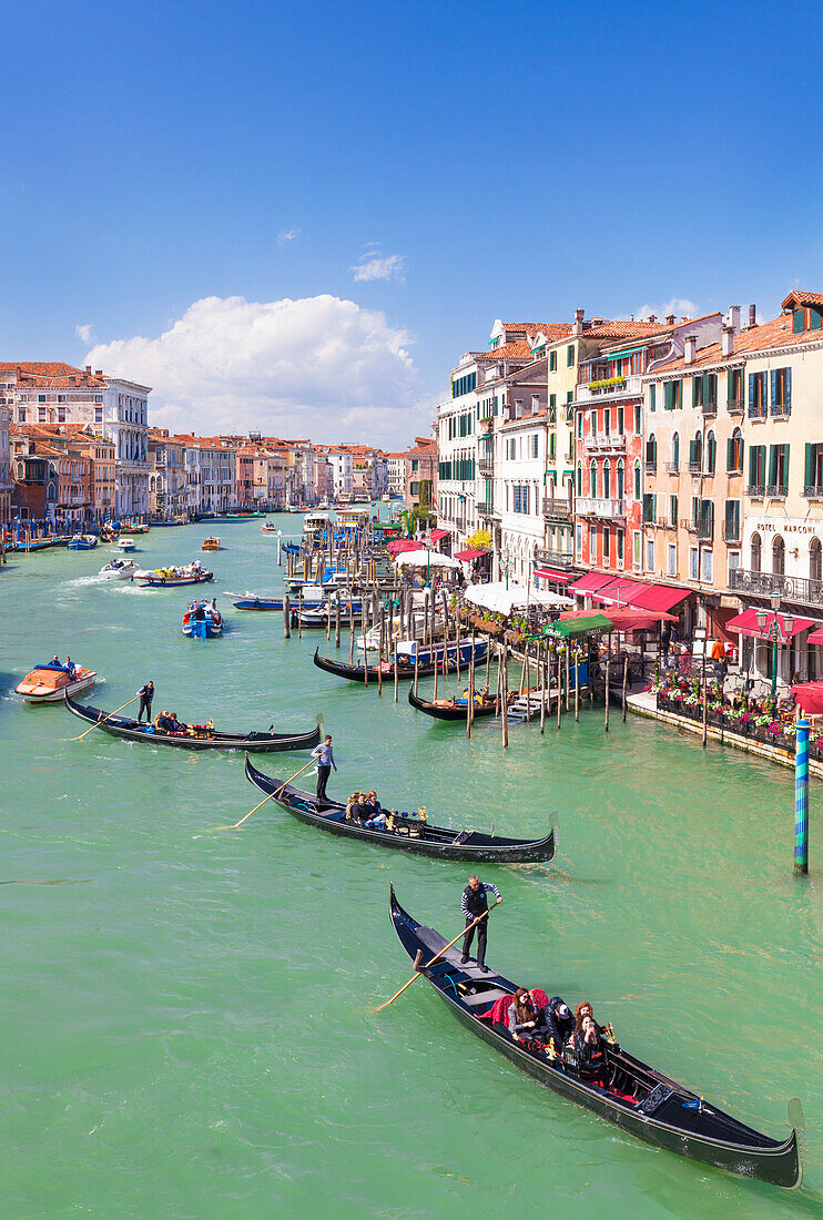 Gondolas, with tourists, on the Grand Canal, next to the Fondementa del Vin, Venice, UNESCO World Heritage Site, Veneto, Italy, Europe
