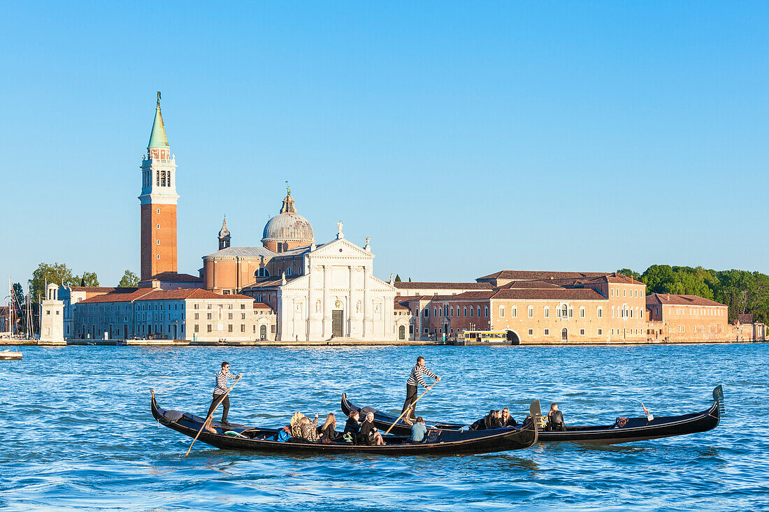 Venetian gondolas with tourists opposite the Island of San Giorgio Maggiore, on the Canale di San Marco, Venice, UNESCO World Heritage Site, Veneto, Italy, Europe