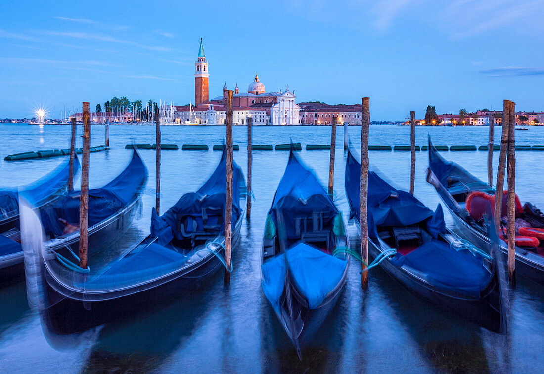 Gondolas moored at night in the Bacino di San Marco (St. Mark's Basin), waterfront, Venice, UNESCO World Heritage Site, Veneto, Italy, Europe