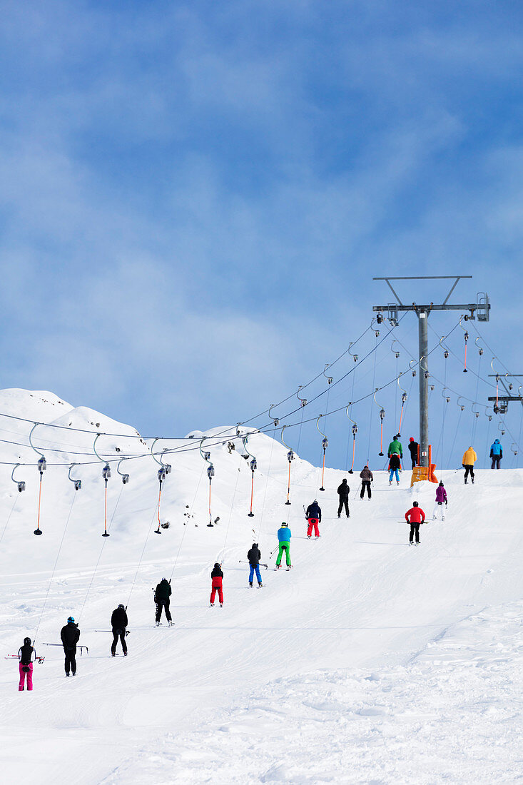 Skiers on a drag lift, Veysonnaz (Verbier), 4 Vallees, Valais, Swiss Alps, Switzerland, Europe