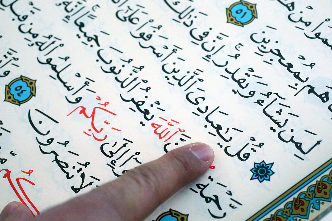 Imam reading the Quran in a mosque, Seine-e-Marne, France, Europe