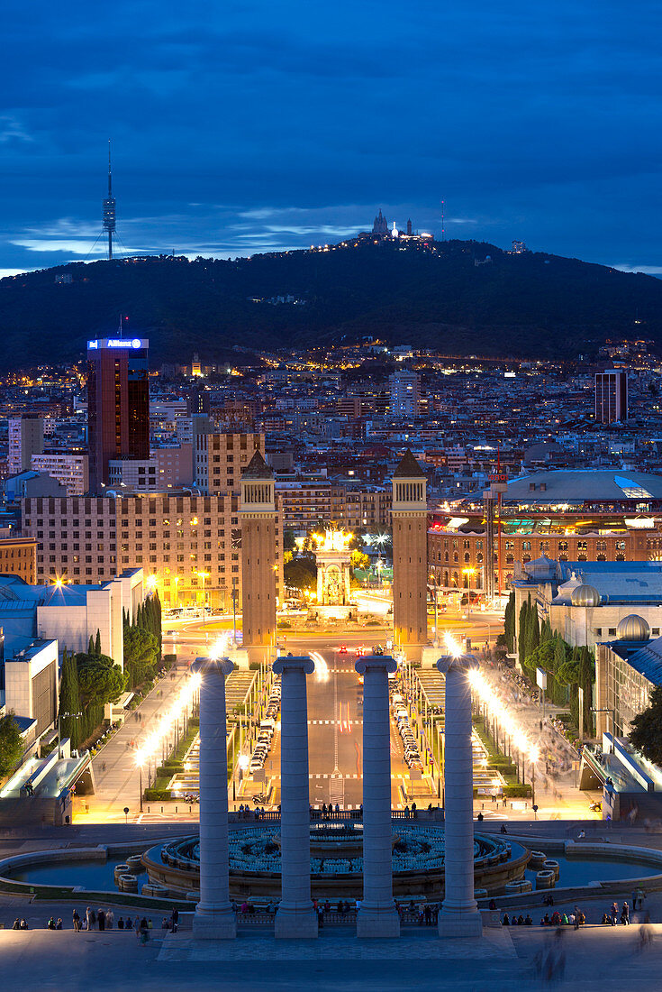 View at twilight from the steps to the Palau Nacional on Montjuic Hill over Barcelona, Catalonia, Spain, Europe