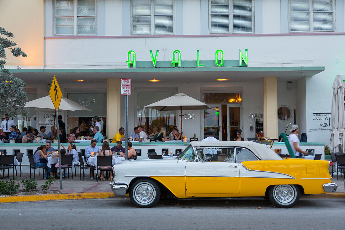 View of Art Deco architecture of Avalon Hotel and classic car, South Beach, Miami Beach, Miami, Florida, United States of America, North America