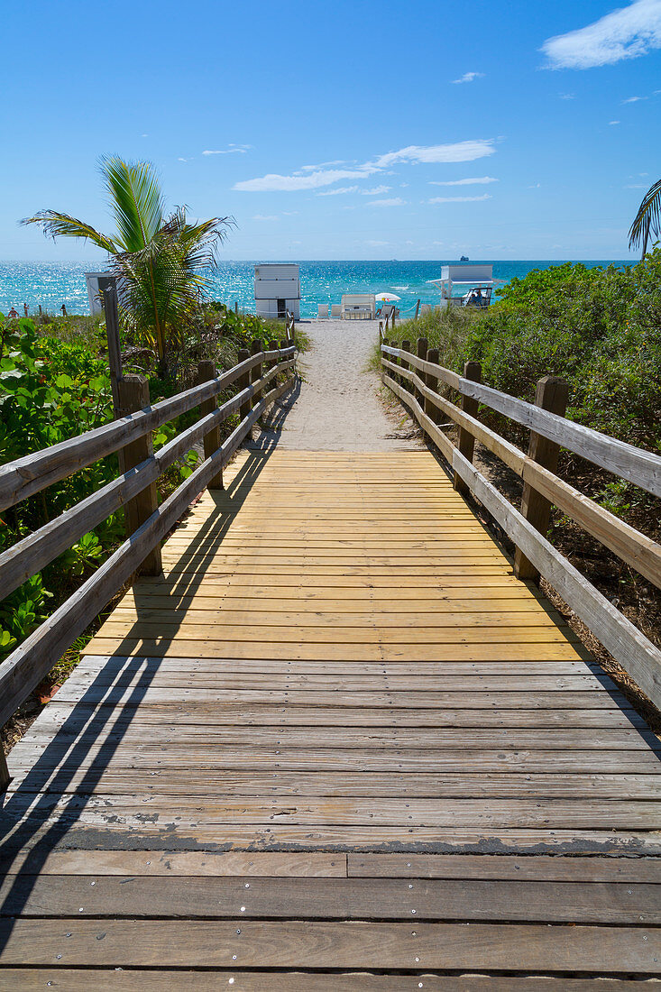 Boardwalk towards the beach and Atlantic Ocean, South Beach, Miami Beach, Miami, Florida, United States of America, North America
