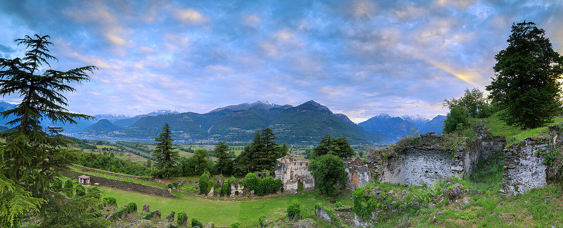 Panorama of ancient ruins of Fort Fuentes framed by green hills at dawn, Colico, Lecco province, Valtellina, Lombardy, Italy, Europe