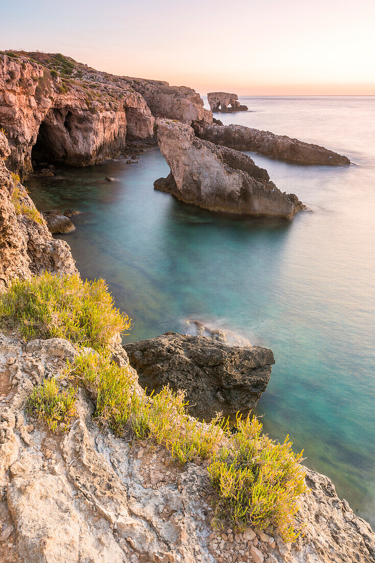 Reef of Siracusa at Sunrise Europe, Italy, Sicily region, Siracusa district, Rock of the two brothers