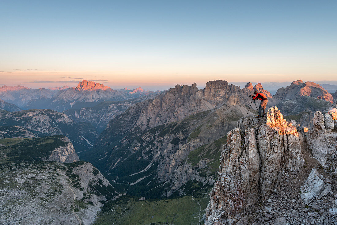 Sesto / Sexten, province of Bolzano, Dolomites, South Tyrol, Italy, A photographer photographed the sunrise at the Three Peaks of Lavaredo