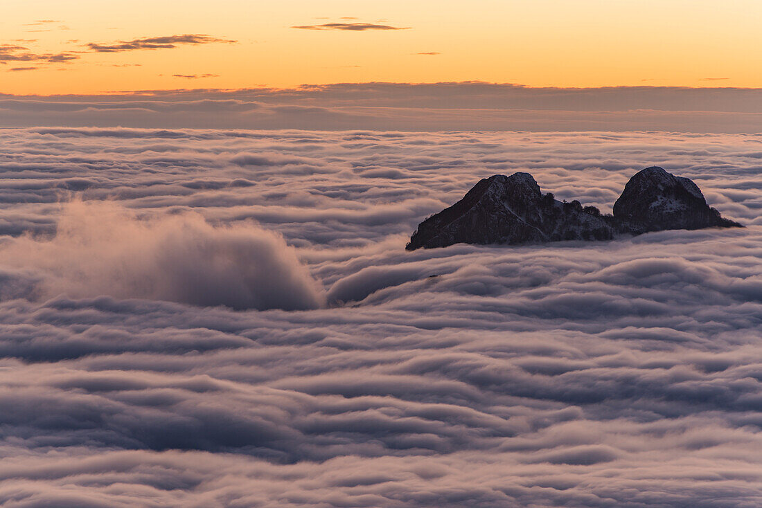 Sunset over the fog, Coltignone Mount, Piani Resinelli, Lecco province, Lombardy, Italy, Europe