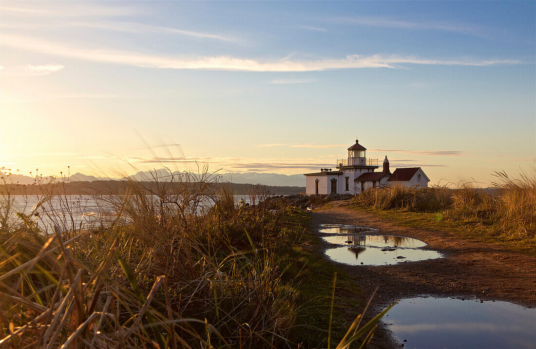 Discovery Park Lighthouse at sunset, Seattle, Washington State, United States