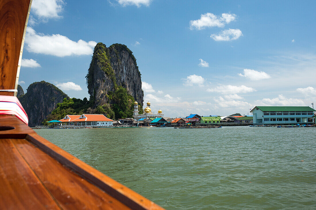 Approaching Ko Panyi by long-tail boat during daytime, Ko Panyi, Phang Nga, Thailand