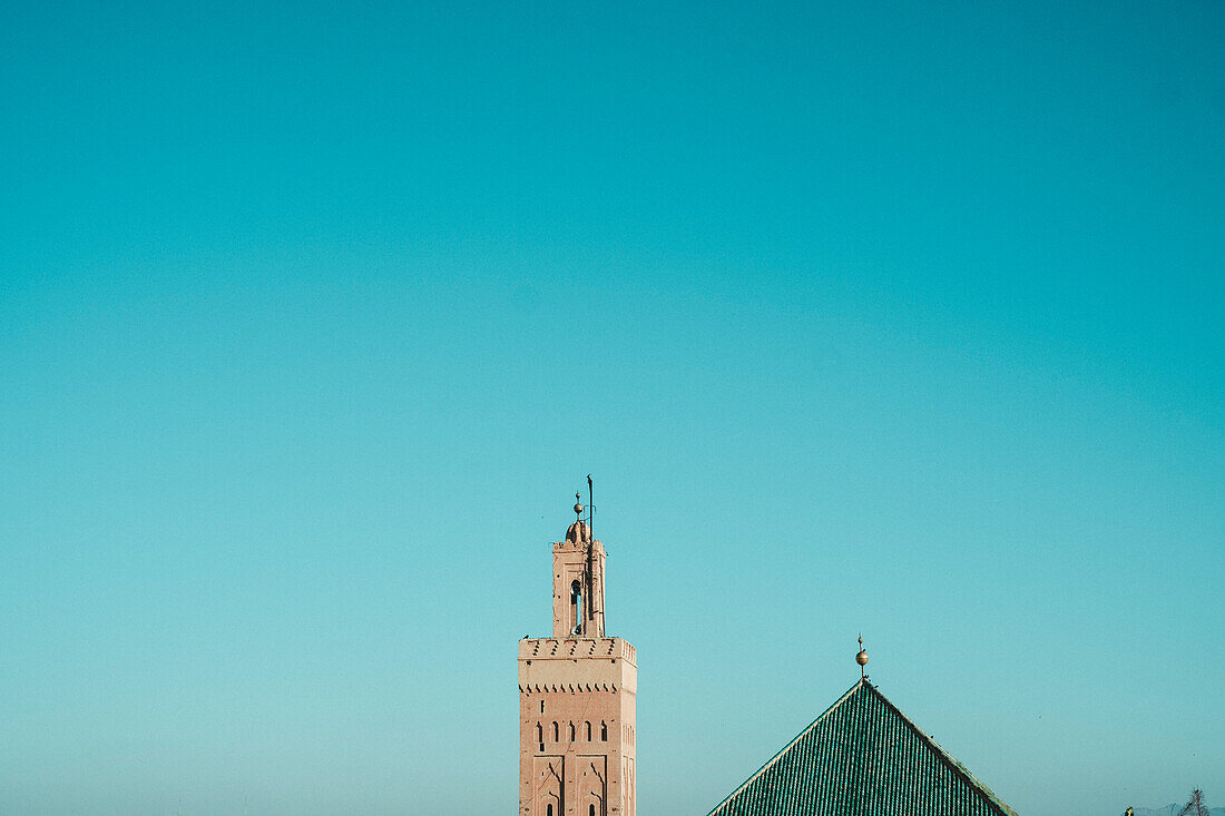 Photograph of Koutoubia Mosque minaret under clear sky, Marrakech, Morocco