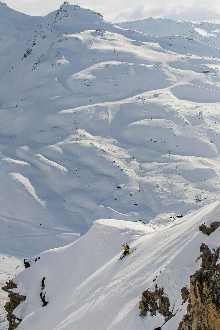 Skier Marking A Turn In Spring Snow In Val Thorens France