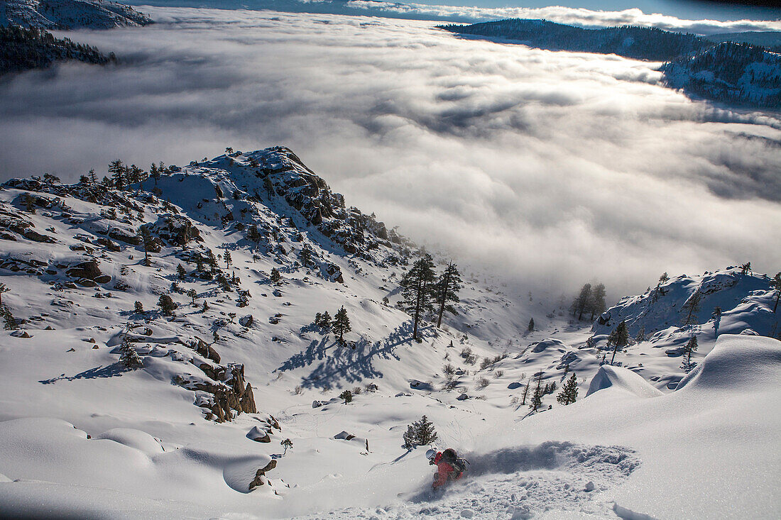 Skier Descend On Snowy Slope Region In Lake Tahoe, California, Use