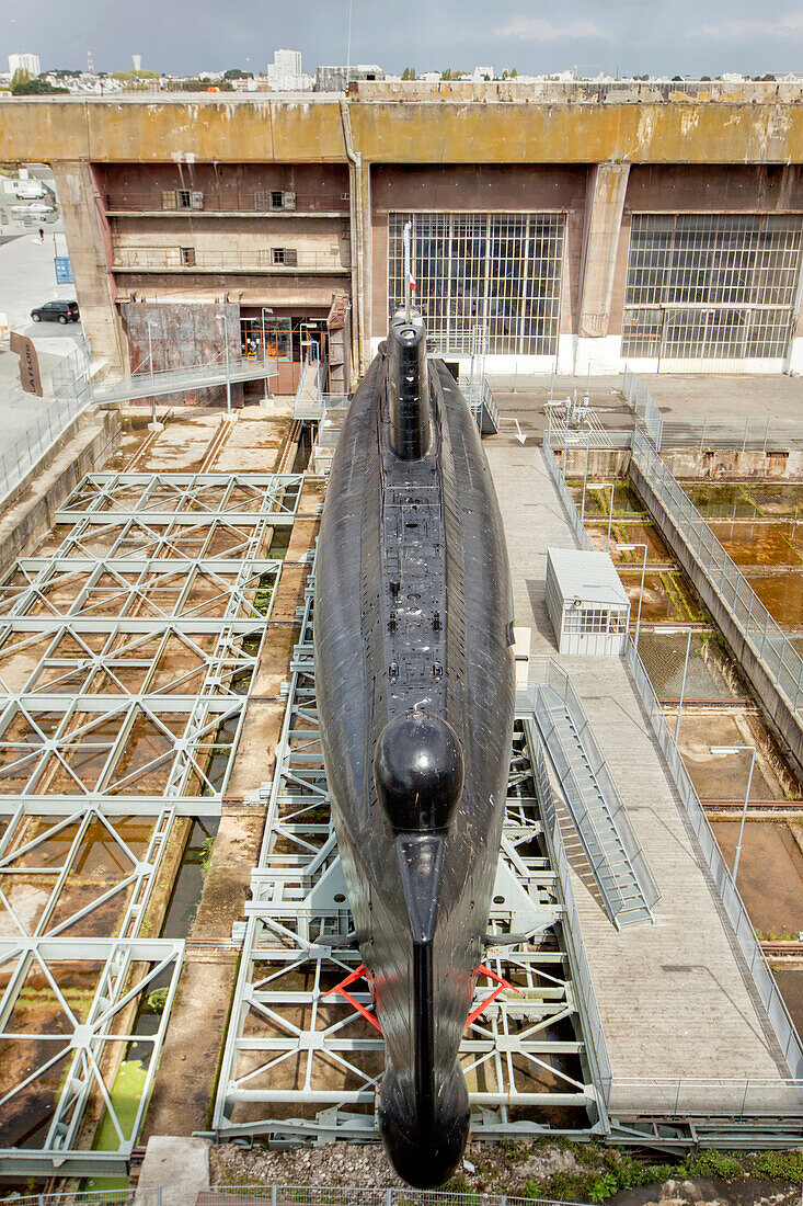 'Situated on the former submarine base at Lorient, the museum submarine Flore.  Lorient; Breton: An Oriant, is a commune and a seaport in the Morbihan department in Brittany in north-western France.'