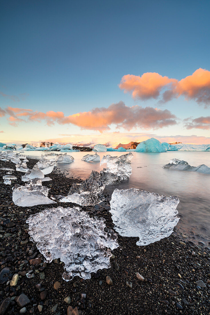 Jokulsarlon, Eastern Iceland, Iceland, Northern Europe, The iconic little icebergs lined in the glacier lagoon during a sunrise