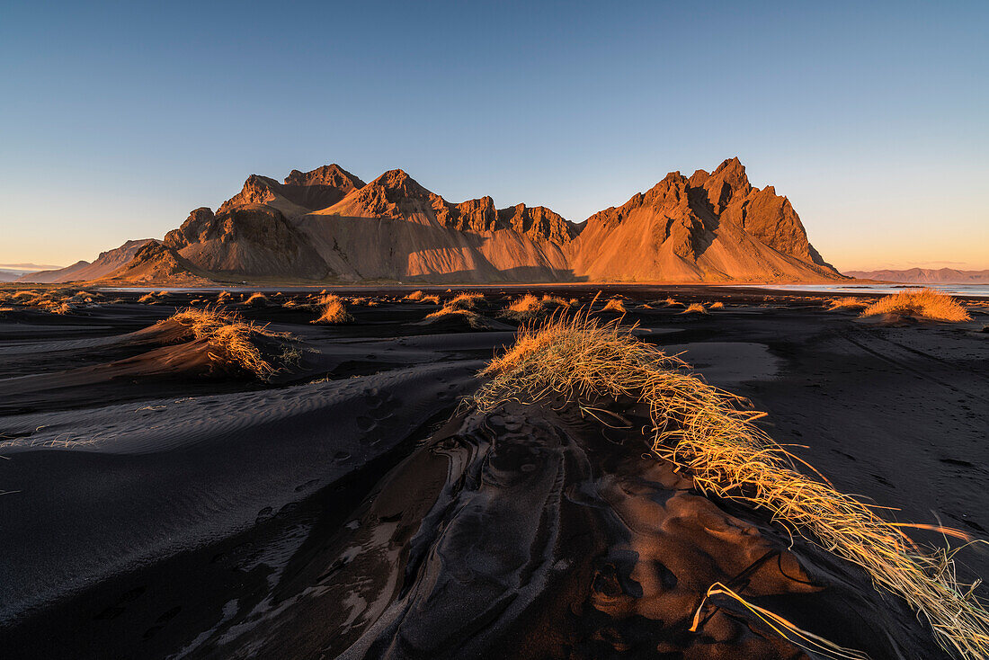 Stokksnes, Hofn, Eastern Iceland, Iceland, Vestrahorn mountain and the black sand dunes at sunset