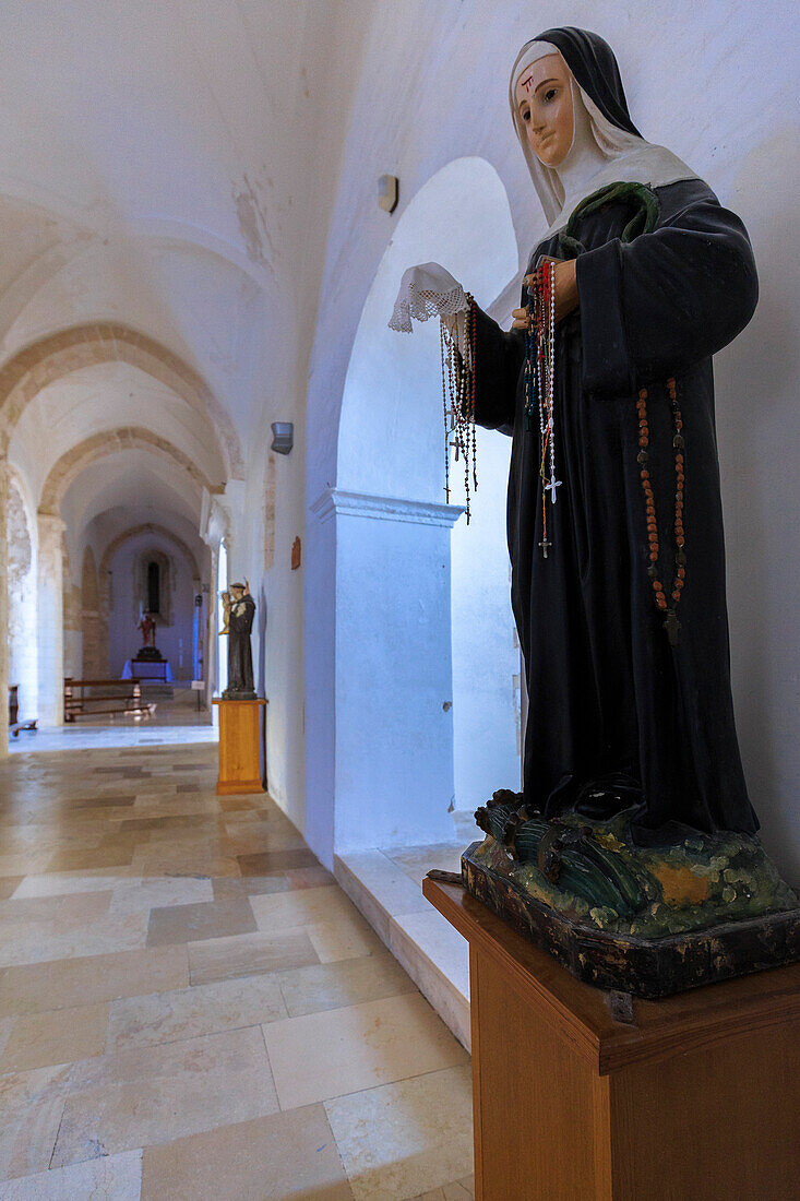 Statues inside Santa Maria Abbey, San NicaolaIsland, Tremiti Islands, Foggia, Puglia, Italy