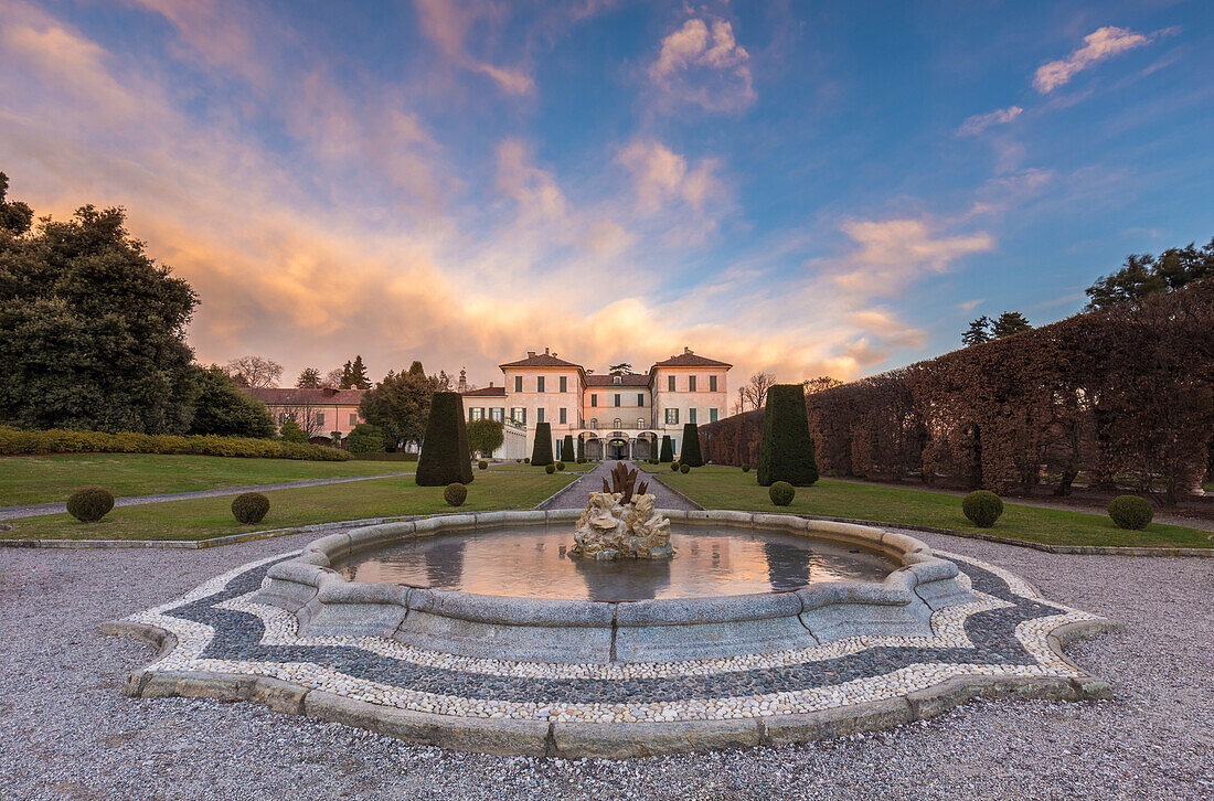 Reflections on the iced fountain of Villa Panza gardens, Varese, Lombardy, Italy