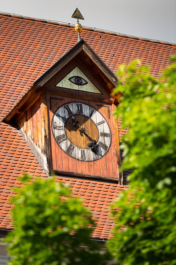 detail of the church roof of Sarntal with a beautiful painted clock, Bolzano province, South Tyrol, Trentino Alto Adige, Italy