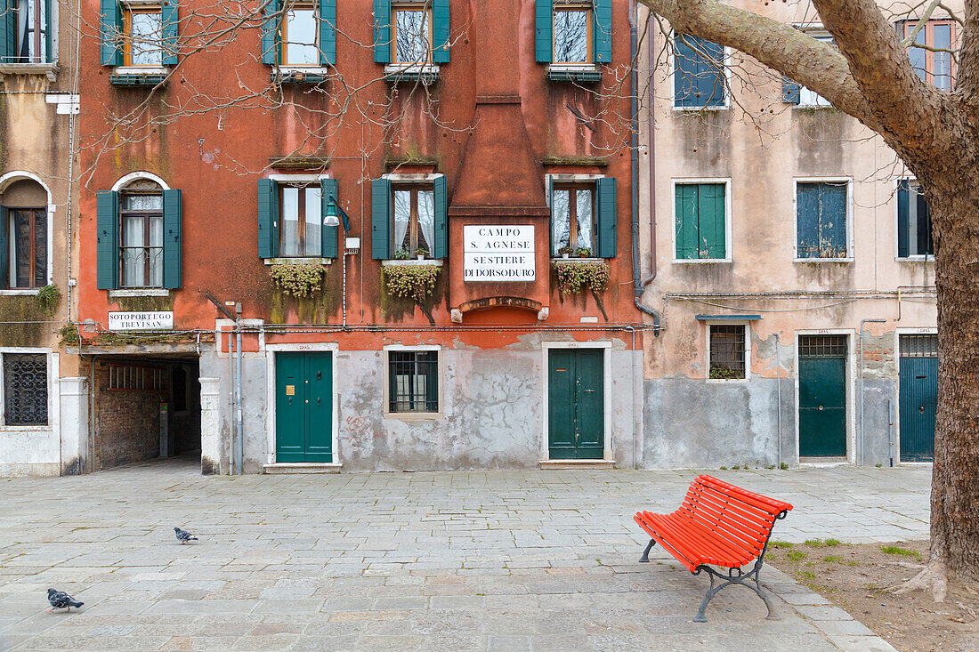 Europe, Italy, Veneto, Venice, Dorsoduro, a view of Campo St, Agnese with a red bench
