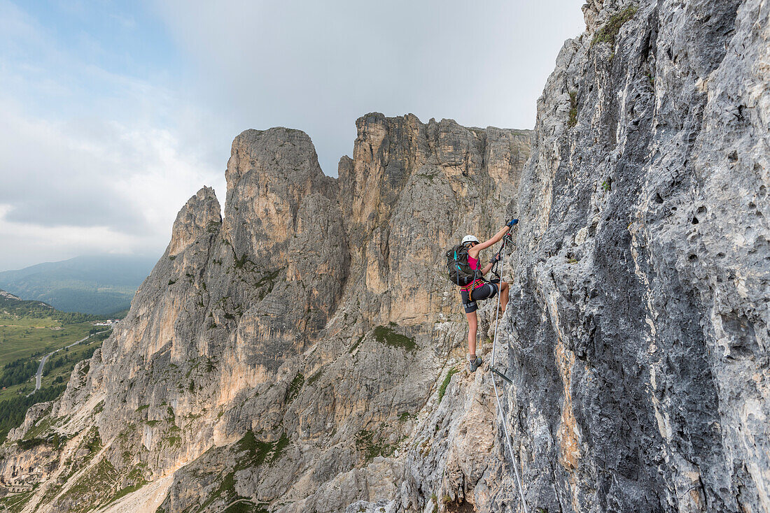 Col dei Bos, Cortina d'Ampezzo, province of Belluno, Veneto, Italy, Climber on the via ferrata degli Alpini