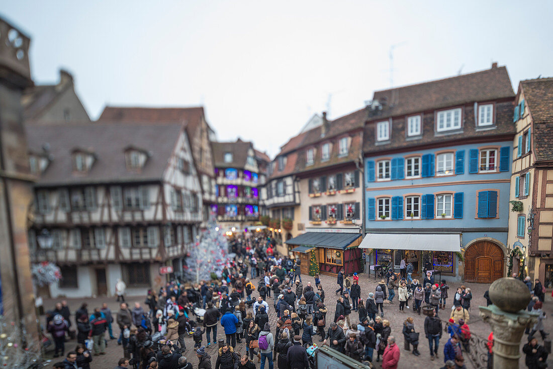 Tourists and Christmas Markets in the old medieval town of Colmar Haut-Rhin department Alsace France Europe