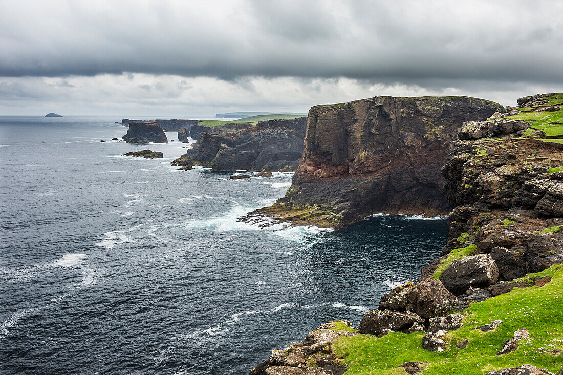 The dramatic cliffs under the Eshaness Lighthouse, Shetland Islands, Scotland, United Kingdom, Europe