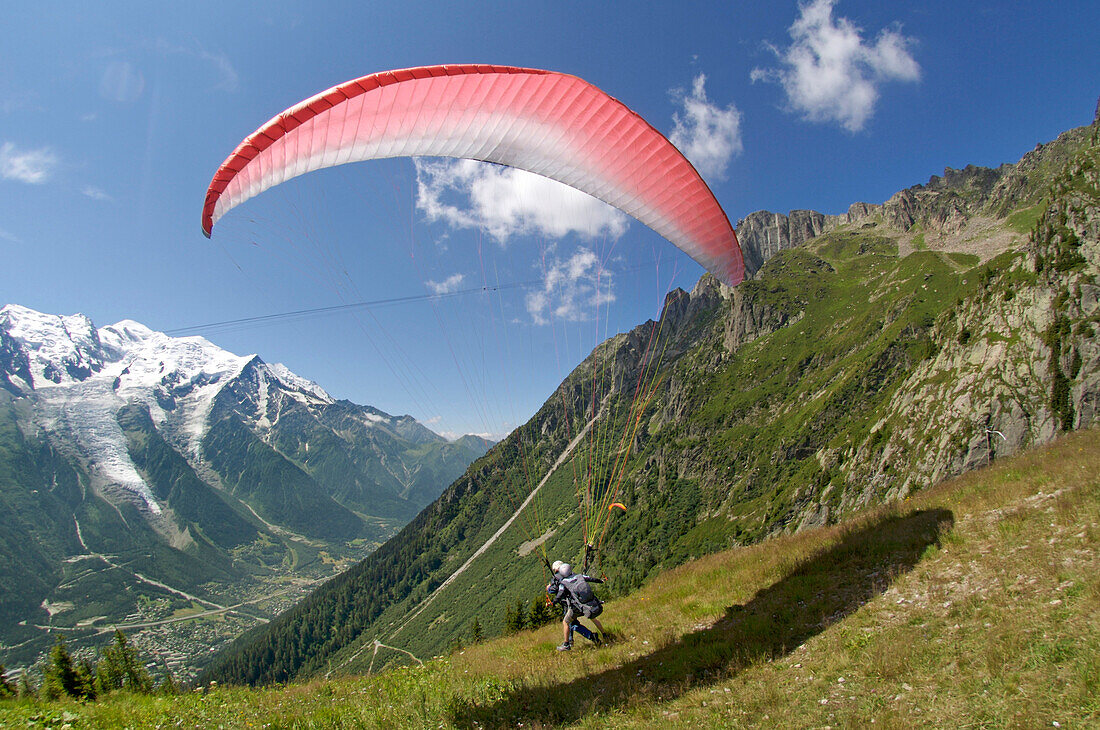 Paragliding over the Chamonix Valley near Mont Blanc in Chamonix, France